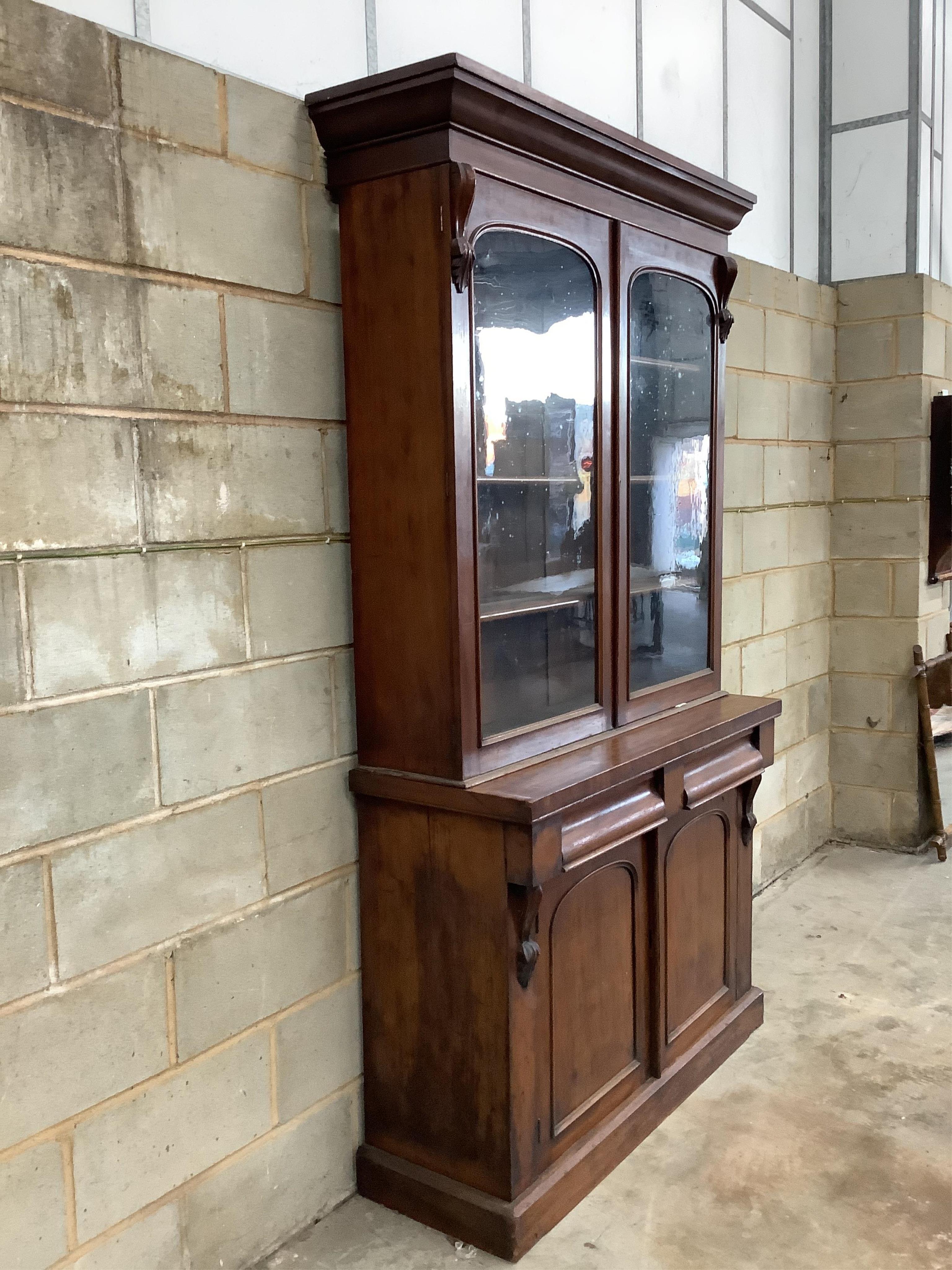 A Victorian mahogany chiffonier bookcase, width 121cm, depth 45cm, height 223cm. Condition - fair